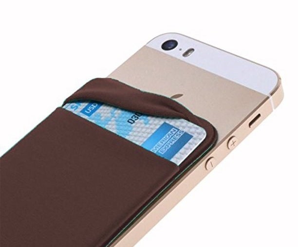 the brown pouch containing credit card attached to back of smartphone