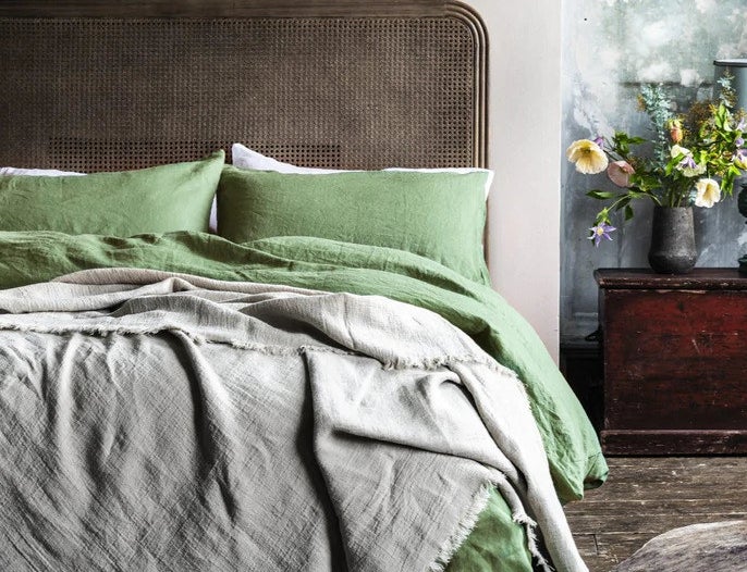 a bedding set with forest green duvet cover and pillows