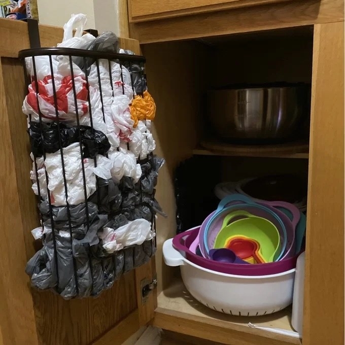 the plastic bag organizer filled with bags