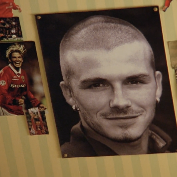 A close up of a David Beckham poster that's on Jess' bedroom wall