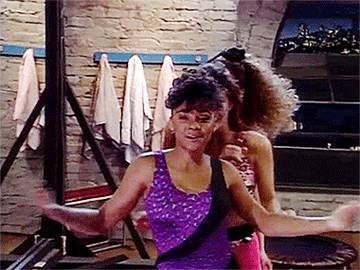 Elizabeth Berkley as Jessie Spano and Tiffani Thiessen as Kelly Kapowski and Lark Voorhies as Lisa Turtle dance in &quot;Saved By The Bell&quot;