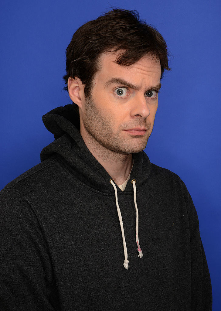Hader posing for a portrait in 2014