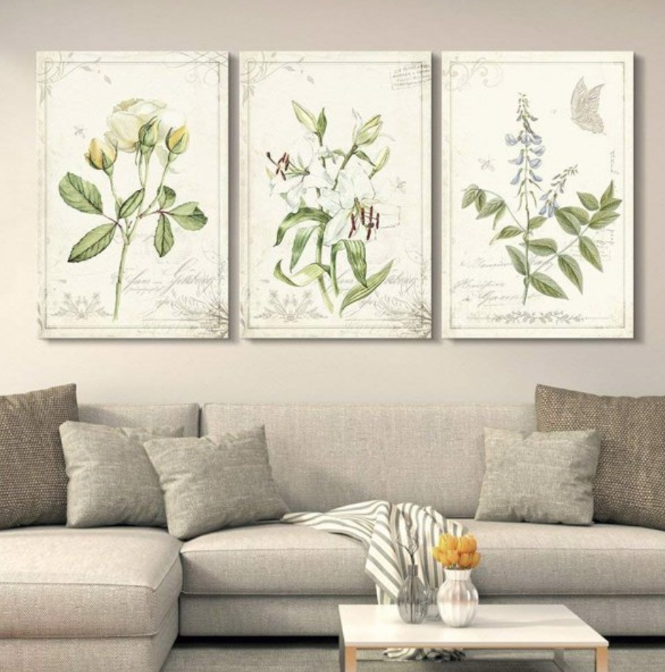 A set of 3 floral canvases