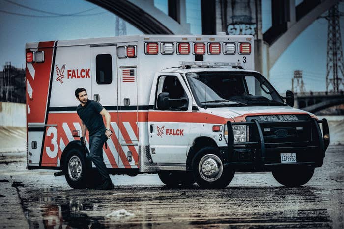 Jake Gyllenhaal walks away from an ambulance