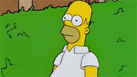Homer Simpson hiding in a bush