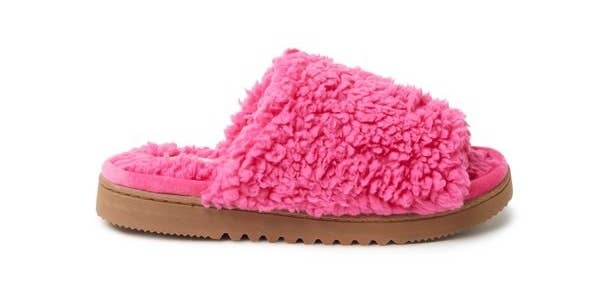 Pink fuzzy slide with brown sole