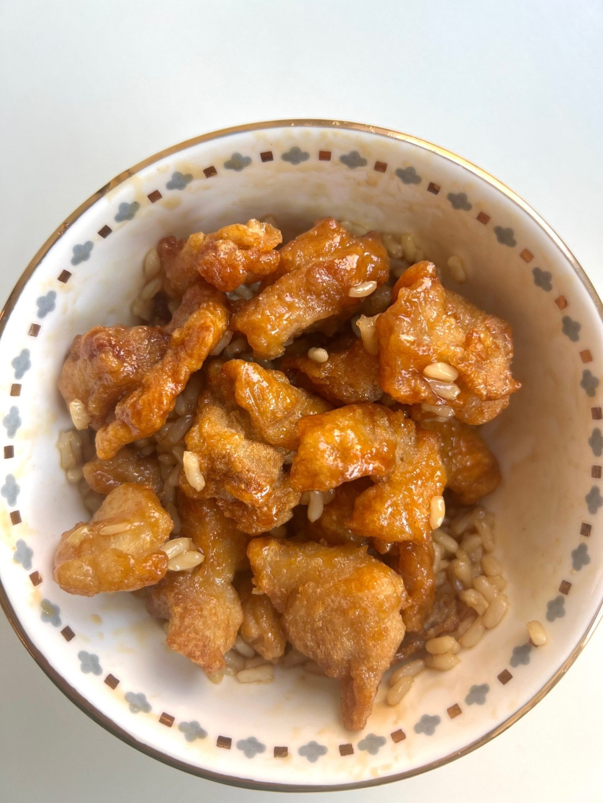 Oven-heated Mandarin Orange Chicken over rice