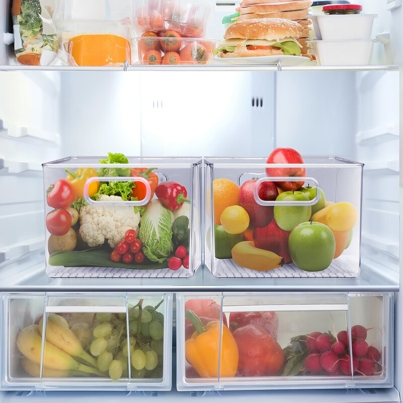 clear plastic refrigerator bins with produce inside