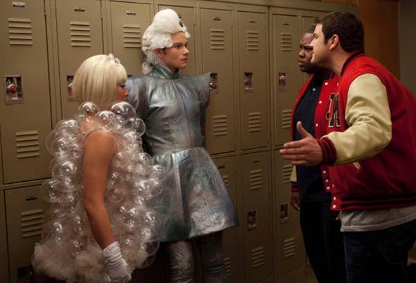 Characters from Glee in Halloween costumes.