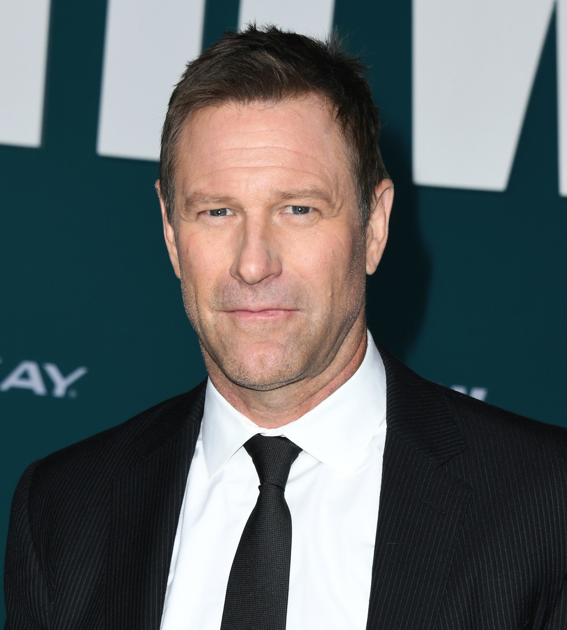 Aaron Eckhart attends the premiere of some film