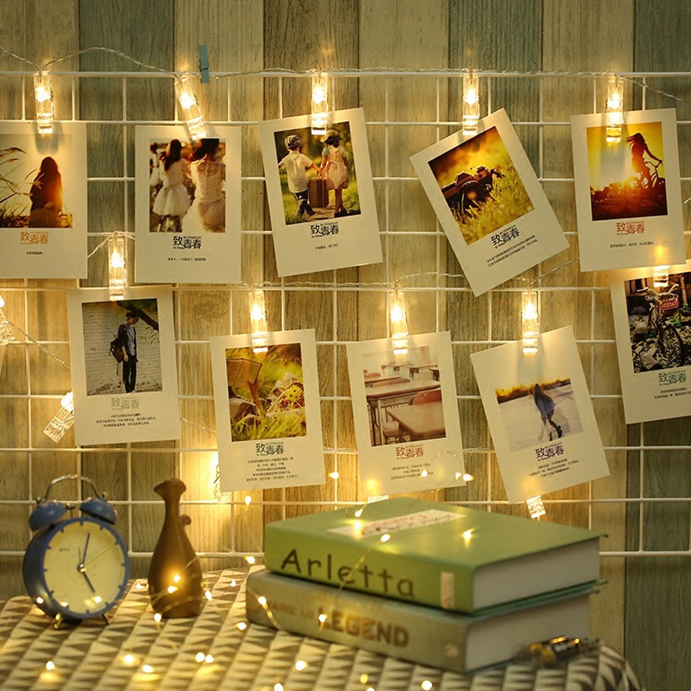 An image of a set of string lights used to hold up Polaroid pictures