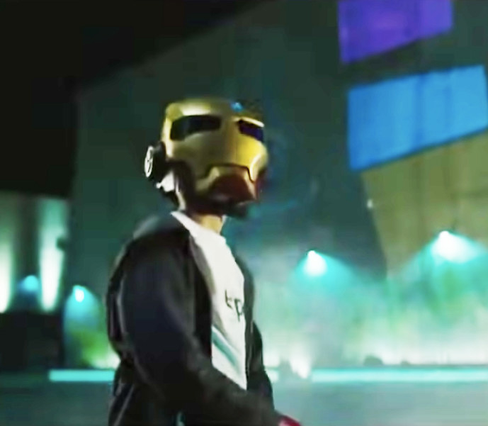 Young boy wearing an Iron Man mask