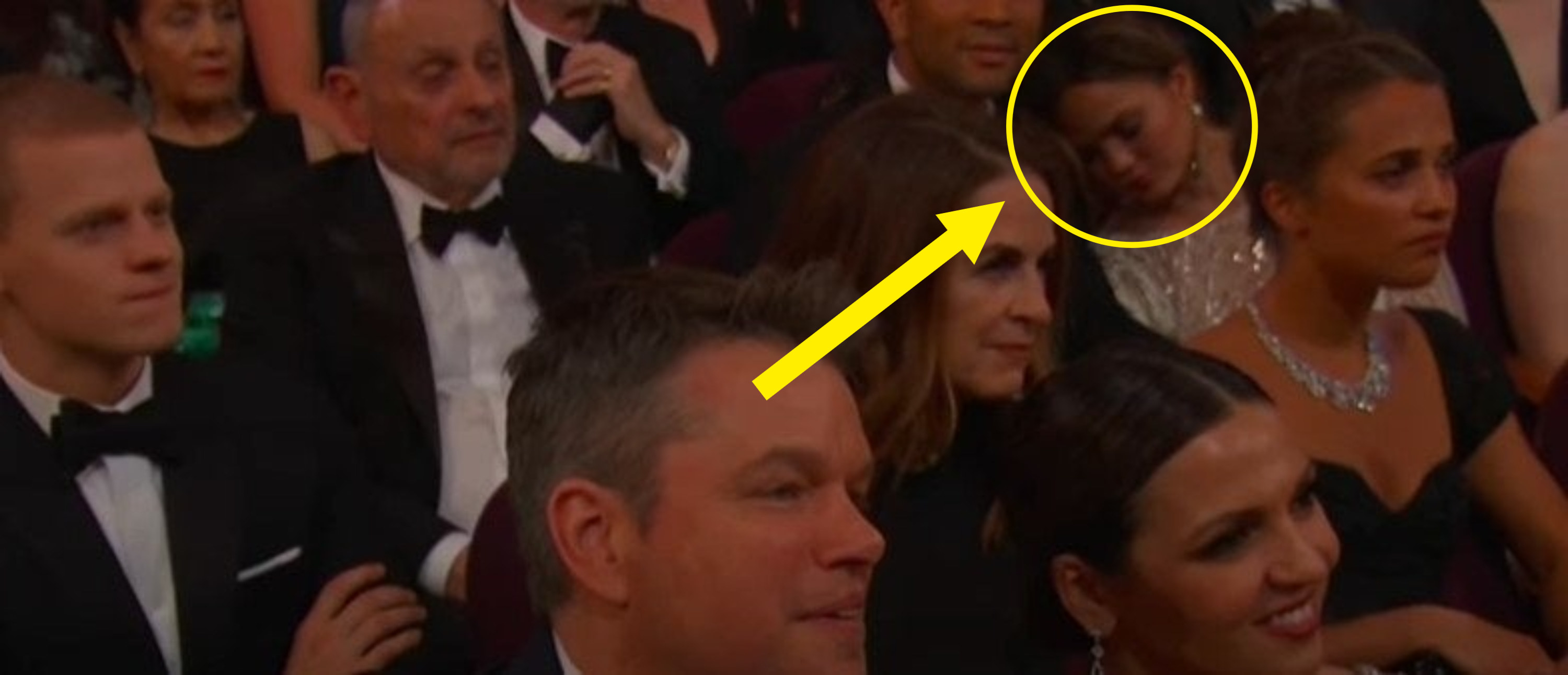 An audience shot showing Chrissy asleep on John Legend&#x27;s shoulder in the corner of the frame