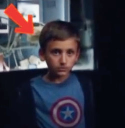 Arrow pointing to Dante wearing a Captain America costume
