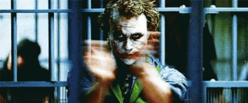 Heath Ledger as the Joker, clapping