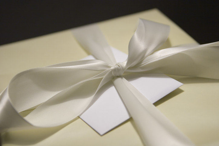 A wrapped gift with a card