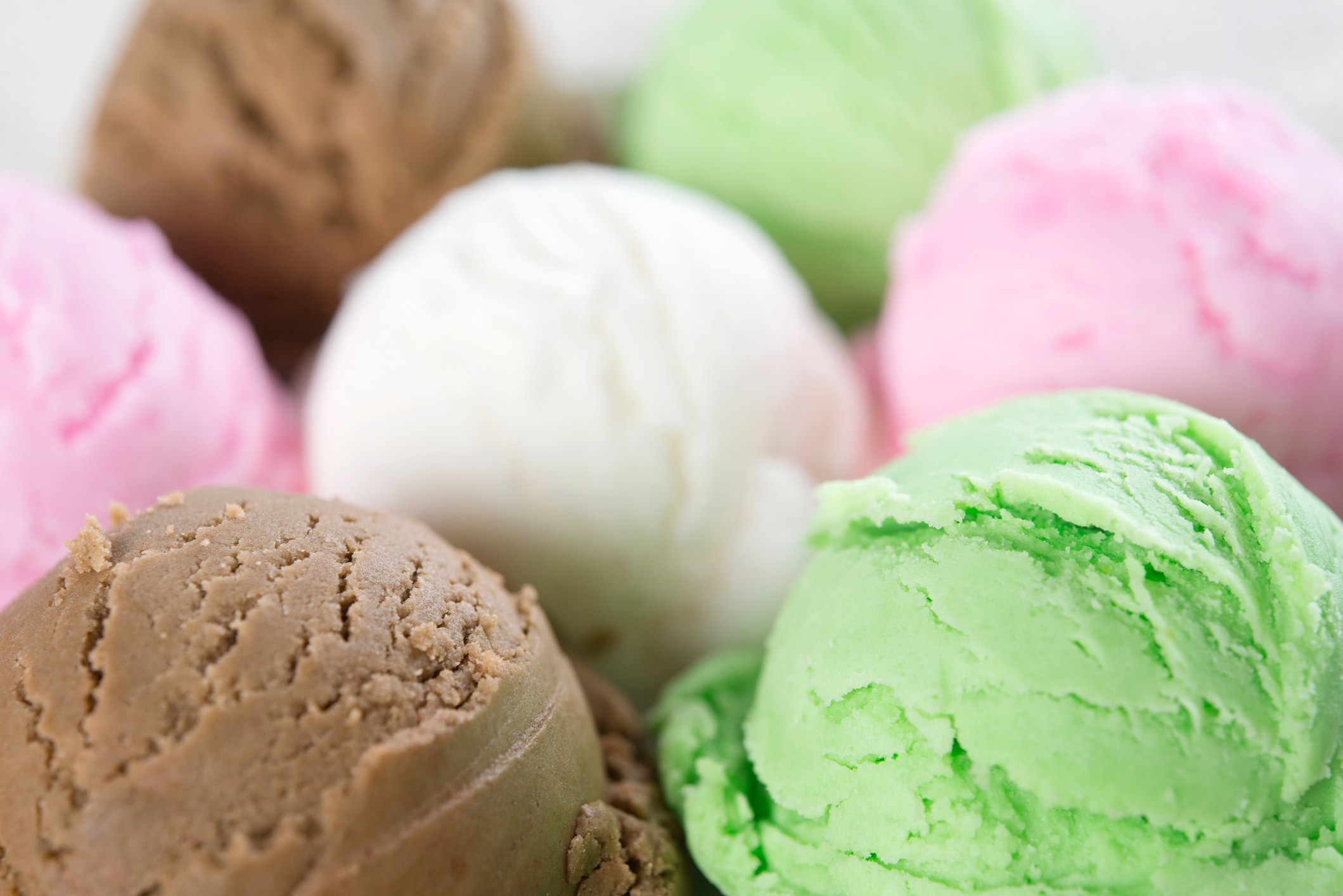 Scoops of different flavors of ice cream.