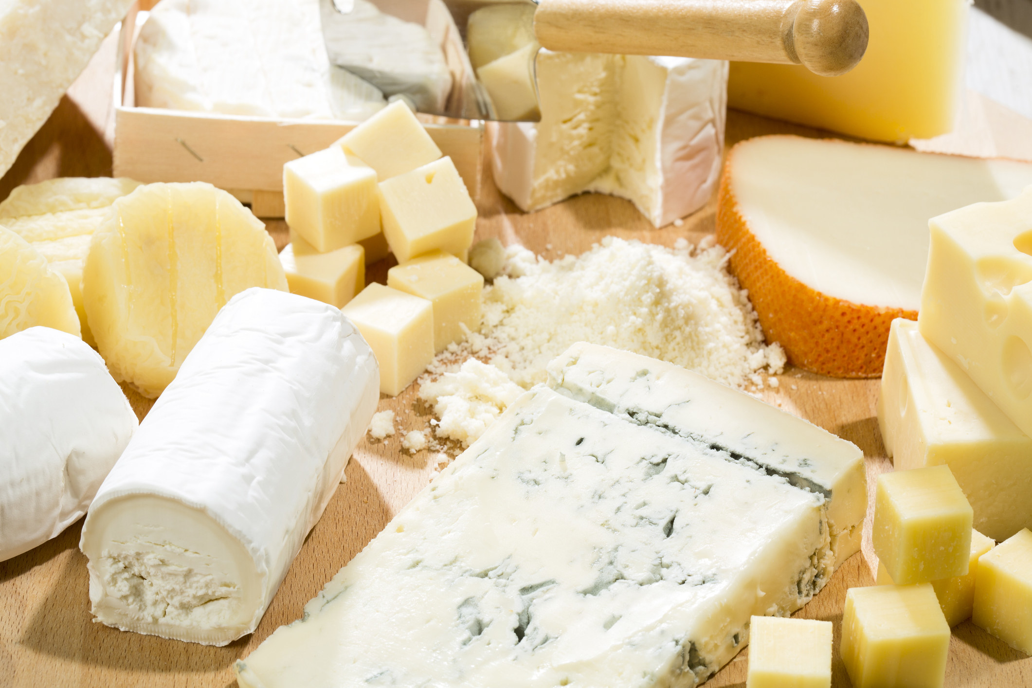 An assortment of different cheeses.