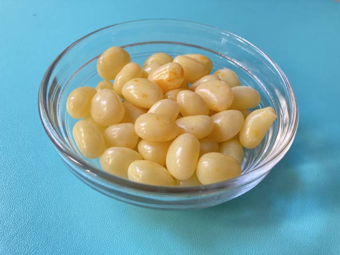 a bowl of yellow butter pecan jelly beans