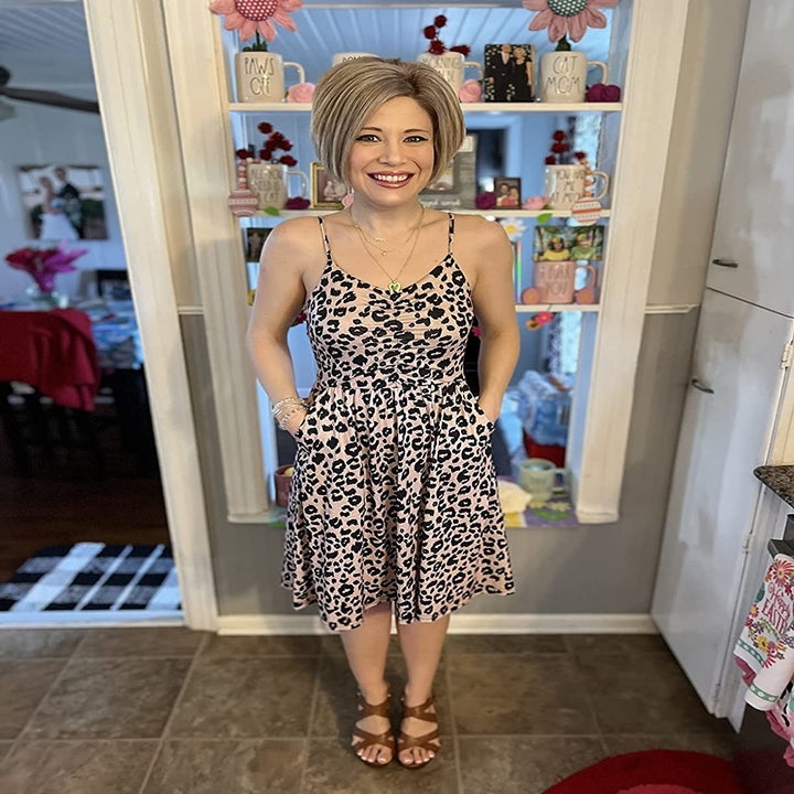 Reviewer wearing the leopard print cotton beach dress