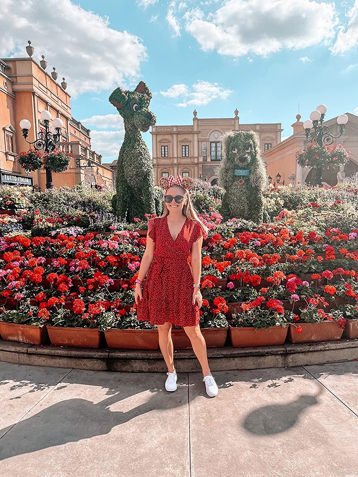 Reviewer wearing the red polka dots ruffle cap-sleeve dress