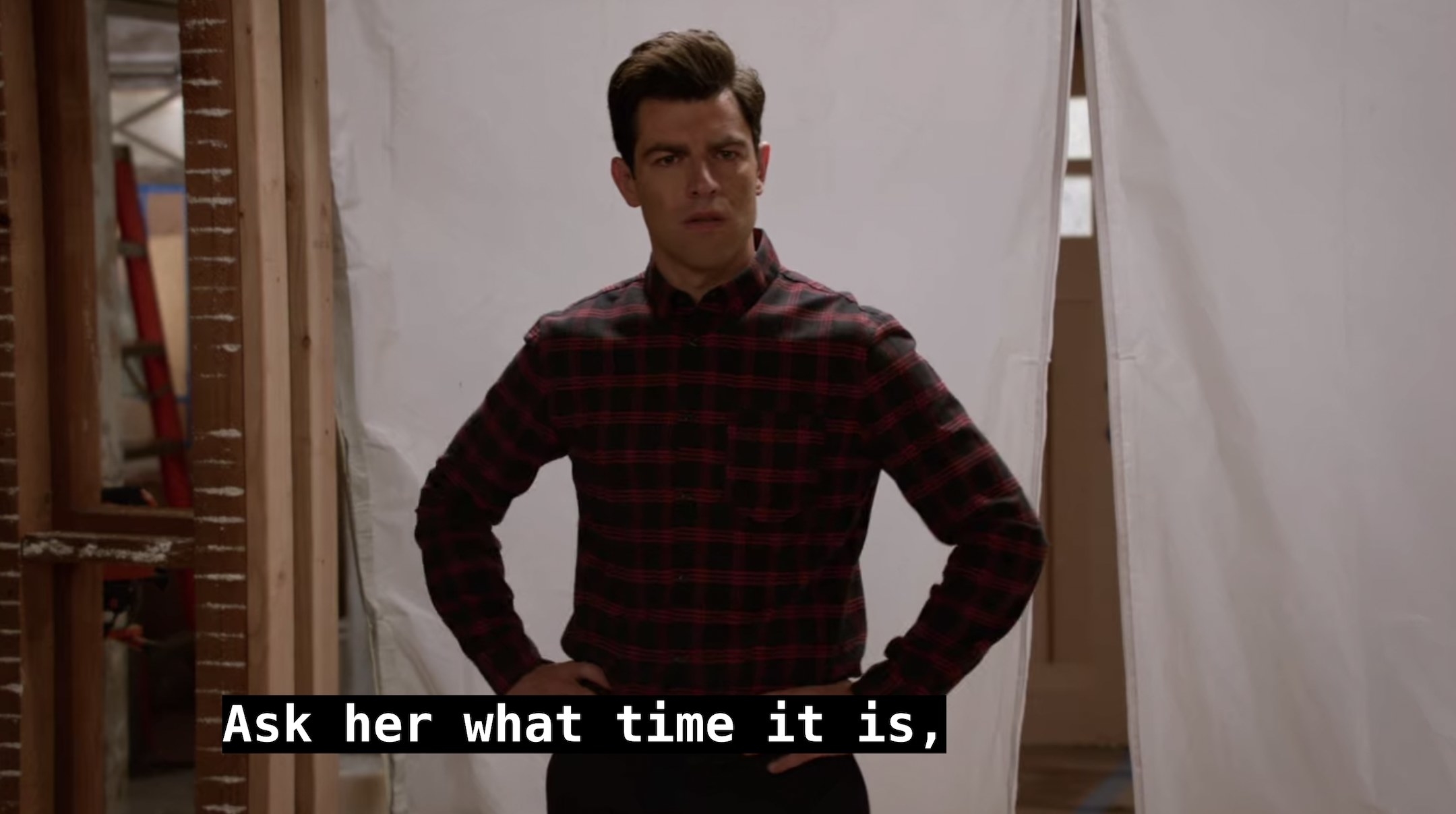 Schmidt looks on confused as Jason starts a sentence saying, Ask her what time it is