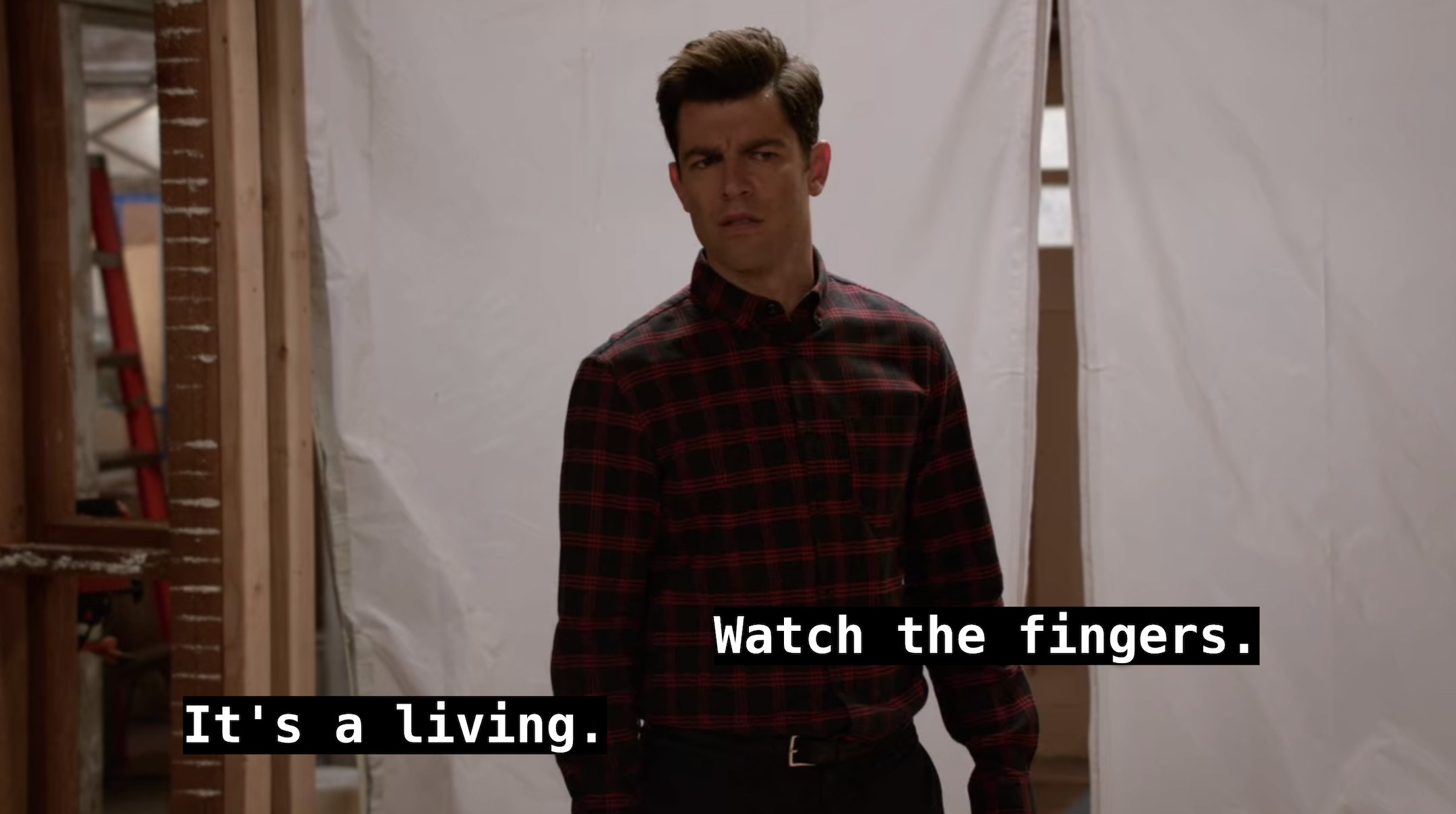 Schmidt looks on confused as he hears Jason say, Its a living, and Nick says, Watch the fingers