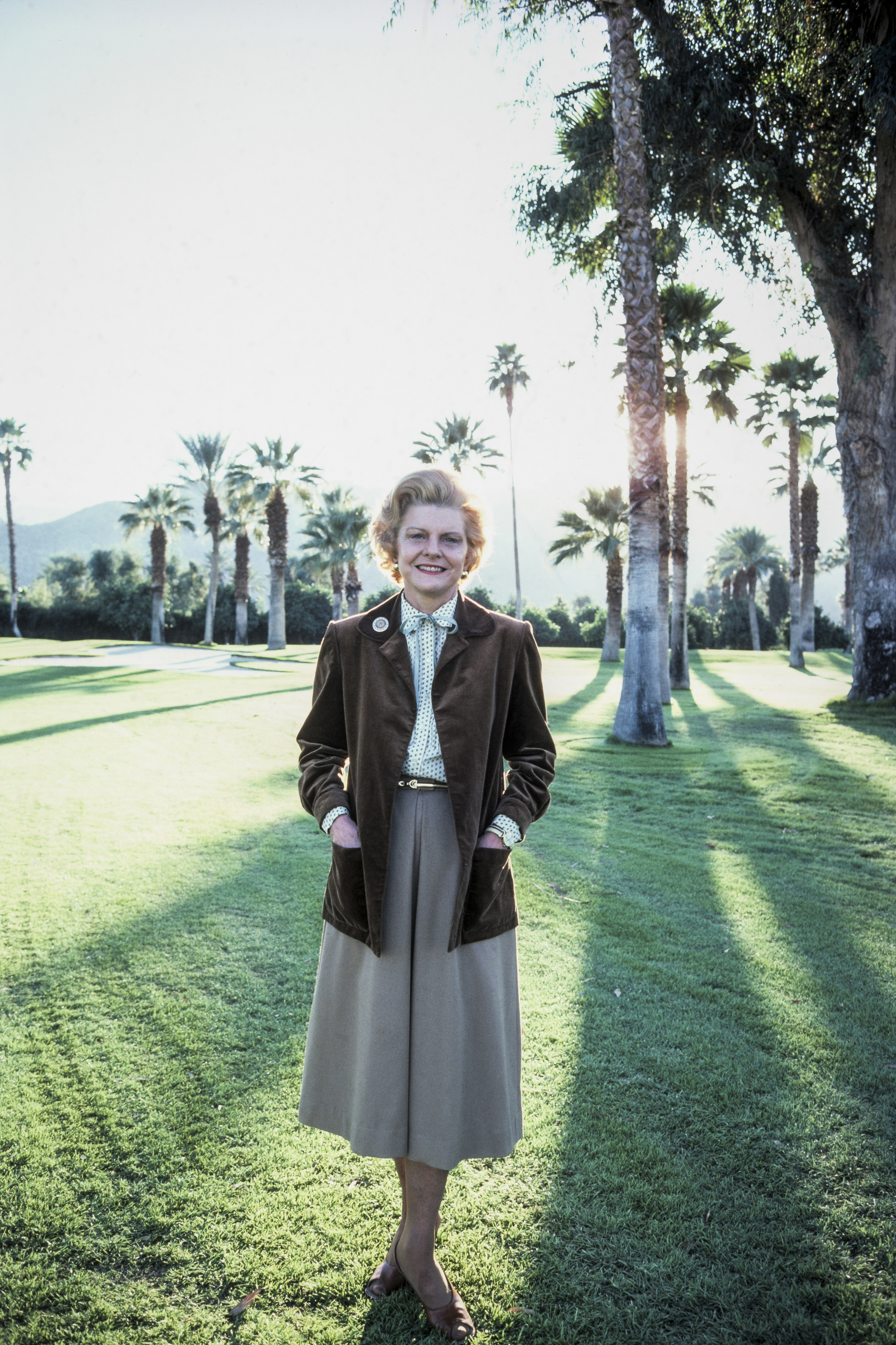 Betty Ford poses in the garden of the Betty Ford Center