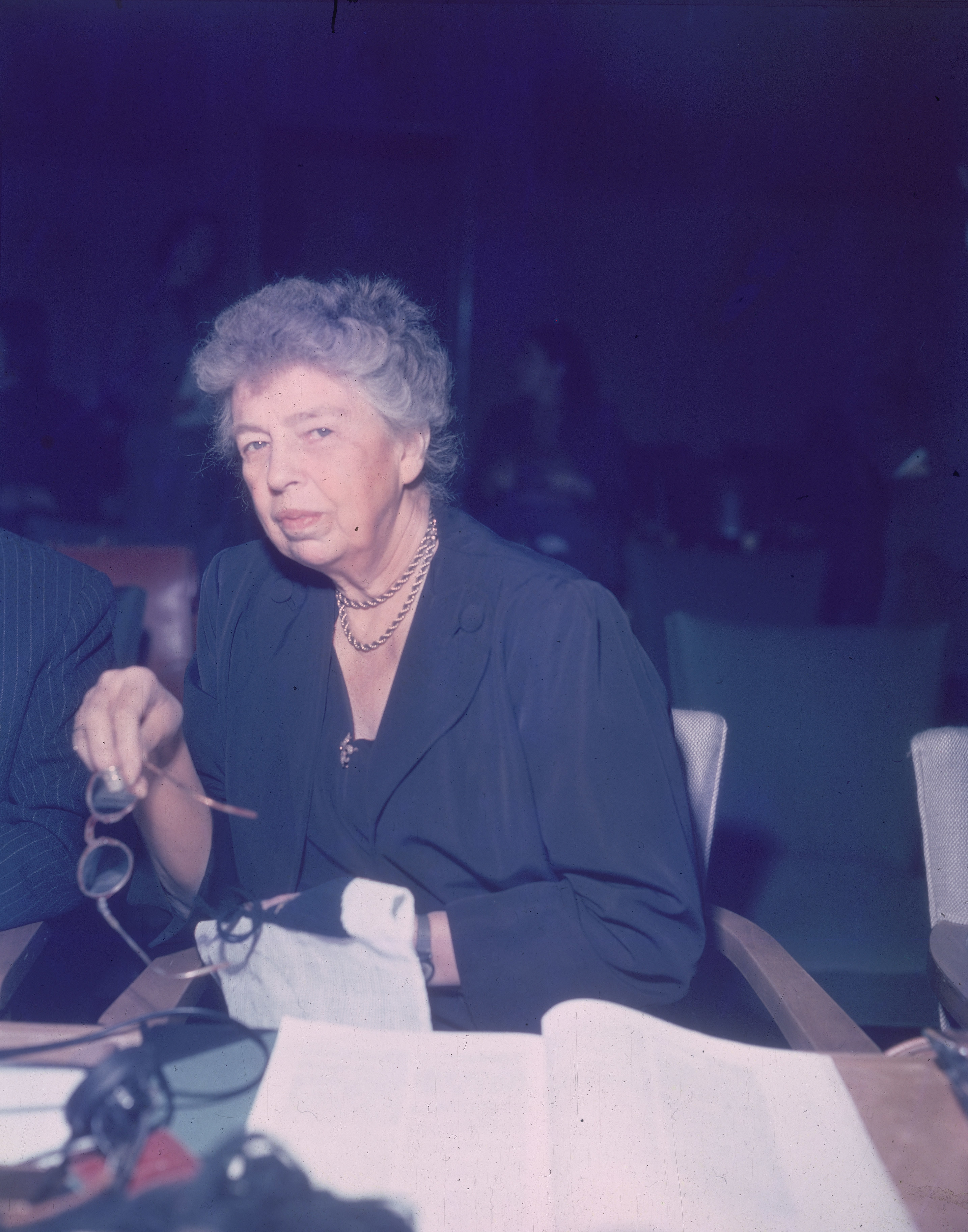 Eleanor Roosevelt sitting at desk