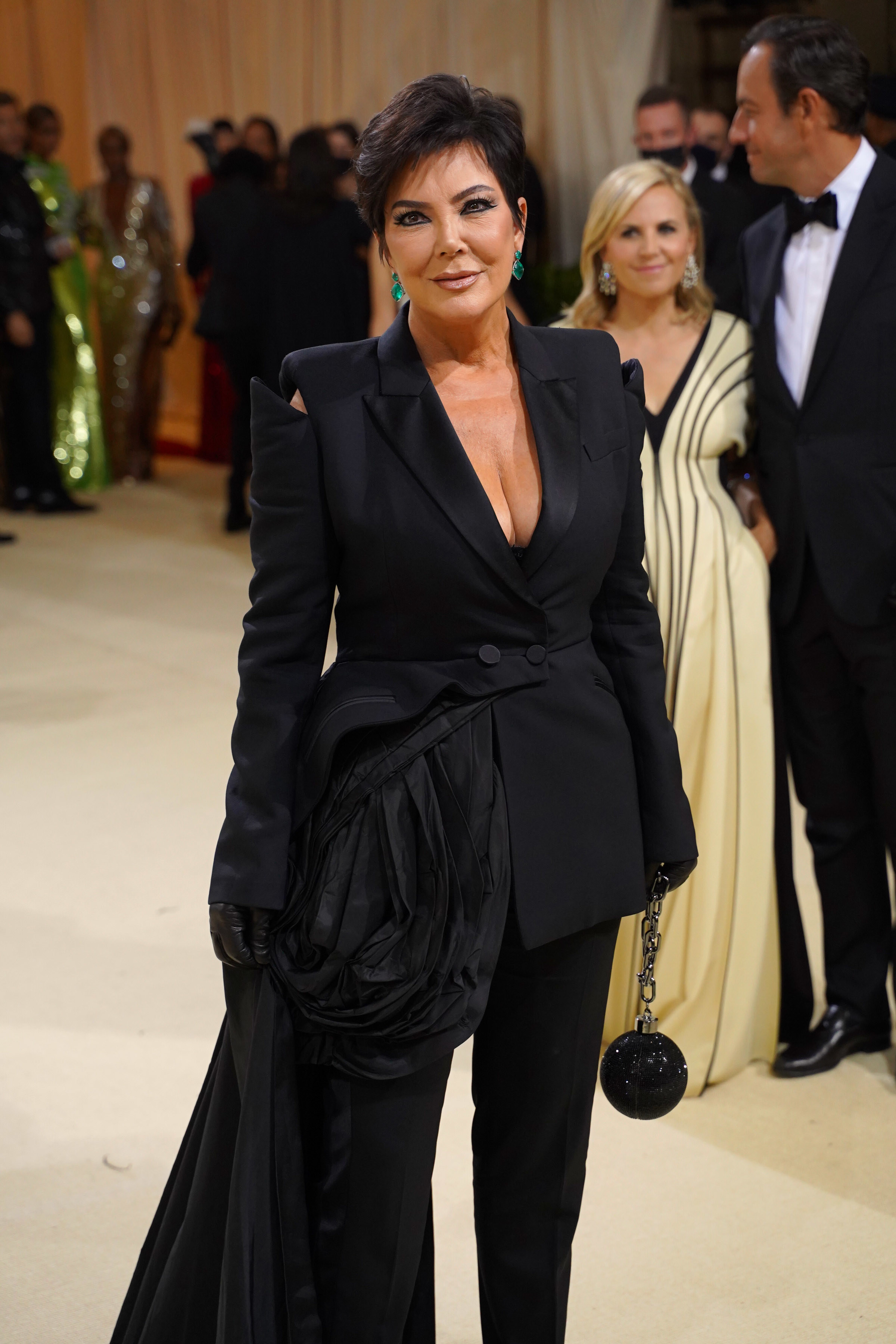 Kris poses on the carpet at the Met Gala