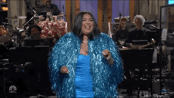 Lizzo laughing while hosting &quot;Saturday Night Live&quot;