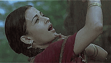 Aishwarya dances, wearing gold bracelets
