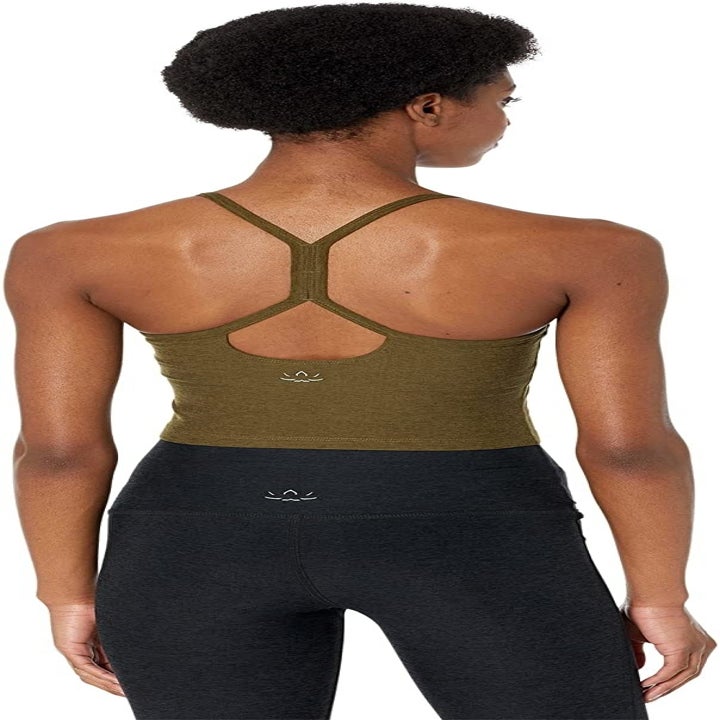 the model showing the racerback back of the top