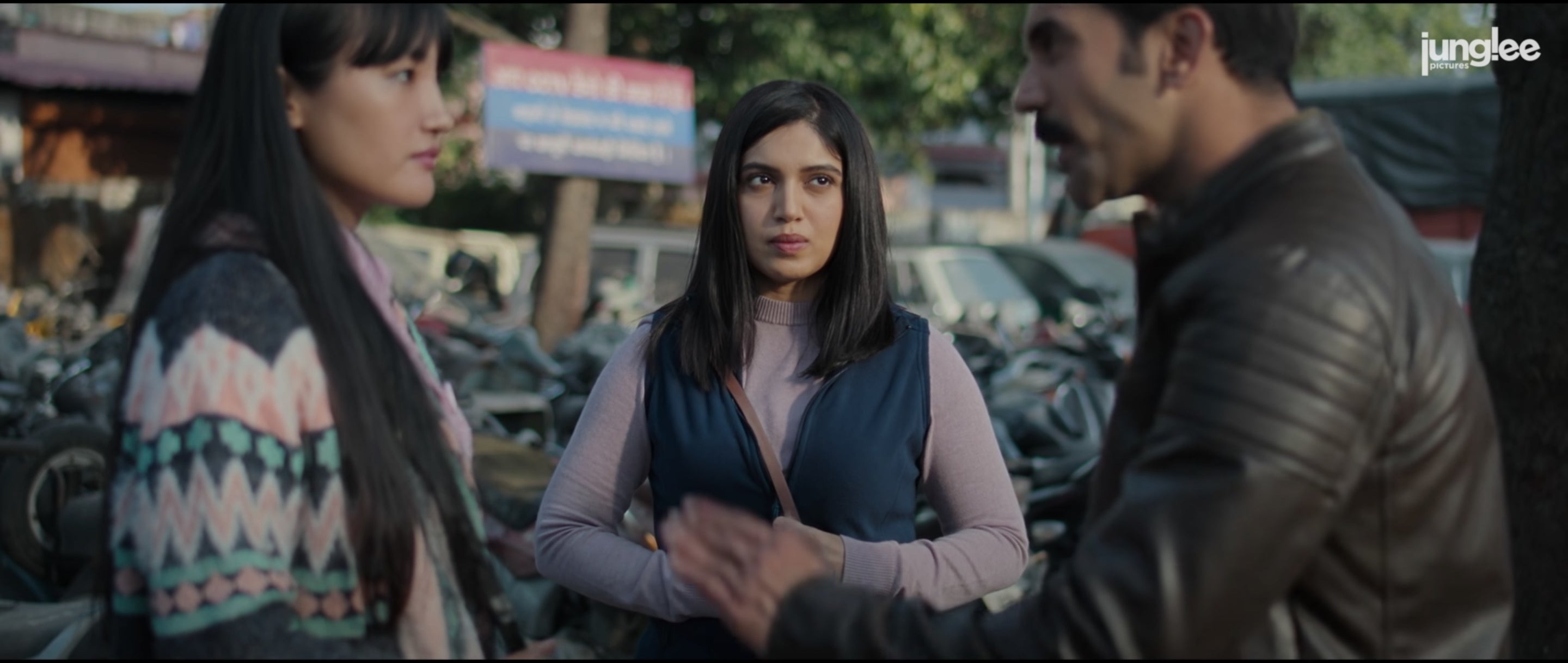 Rajkummar Rao and Chum Darang arguing, while Bhumi Pednekar watches them