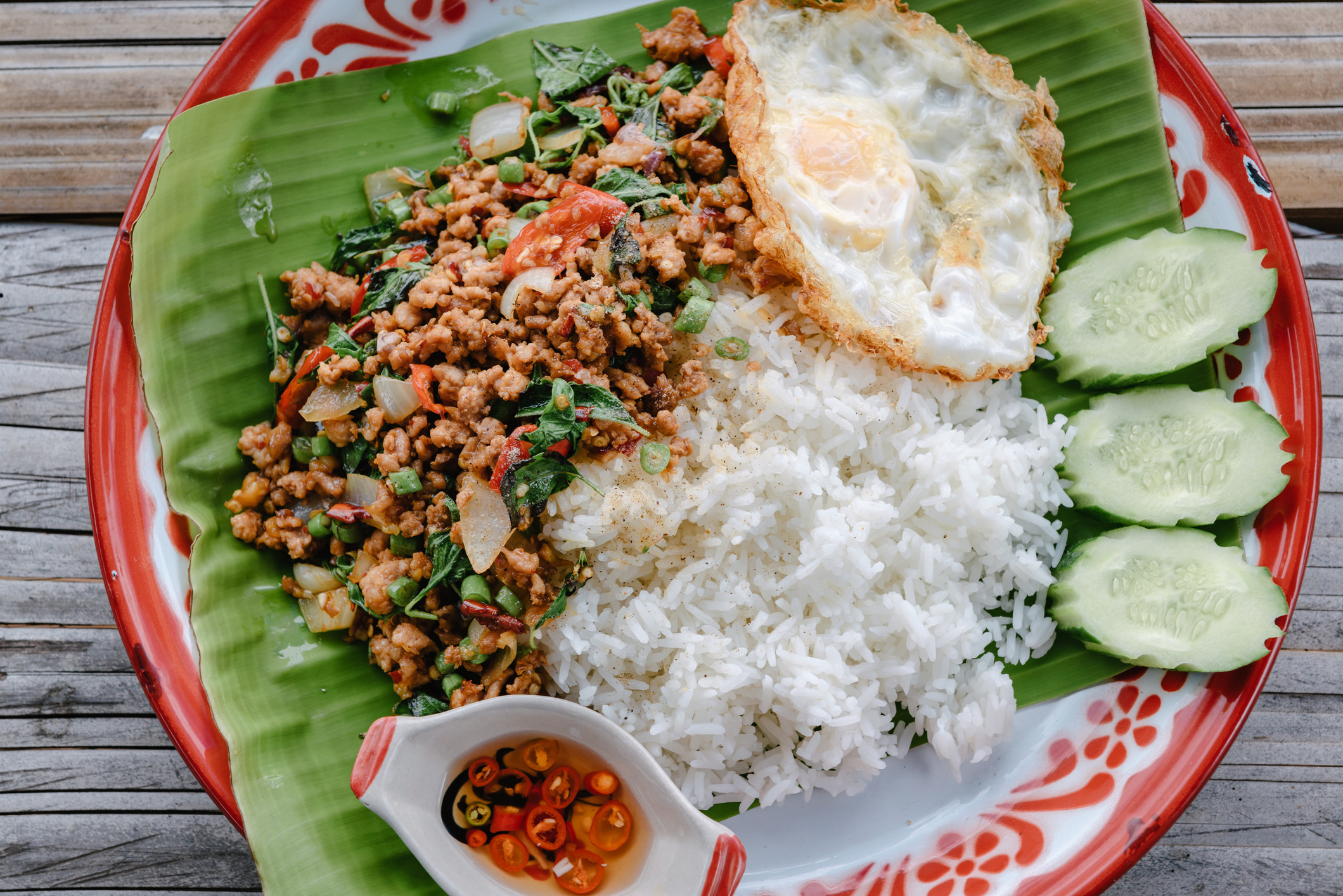 Thai stir-fried pork with rice and egg.