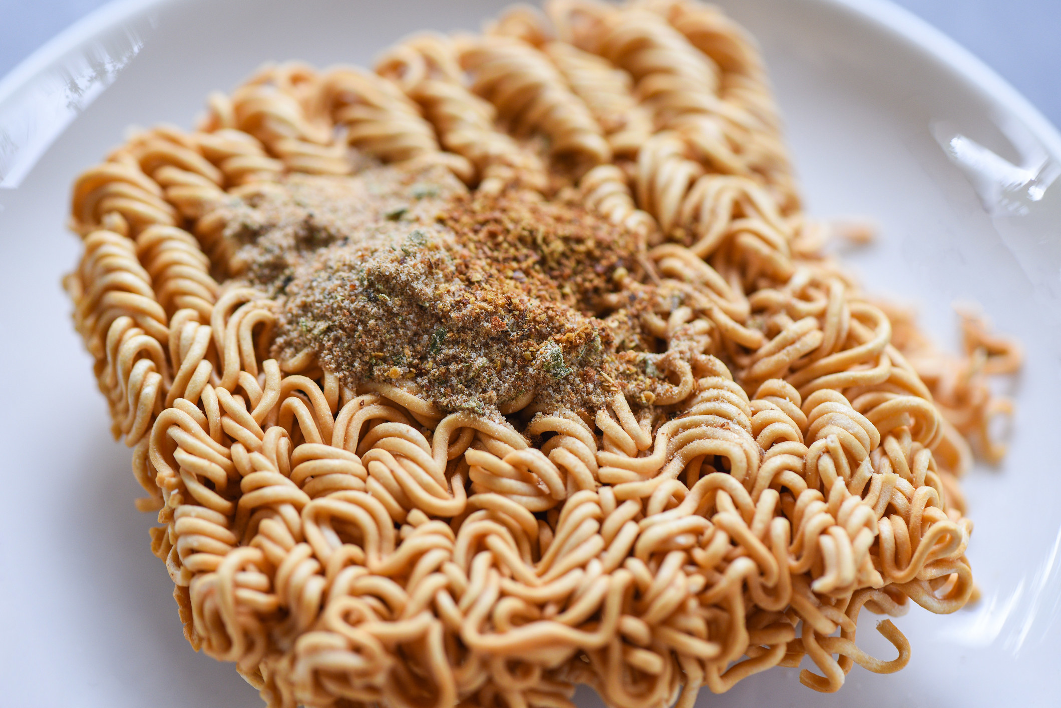 Packed ramen noodles with MSG seasoning.
