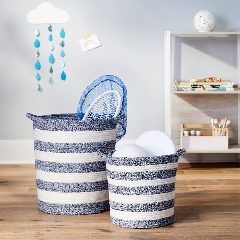 rope baskets with blue and white stripes.