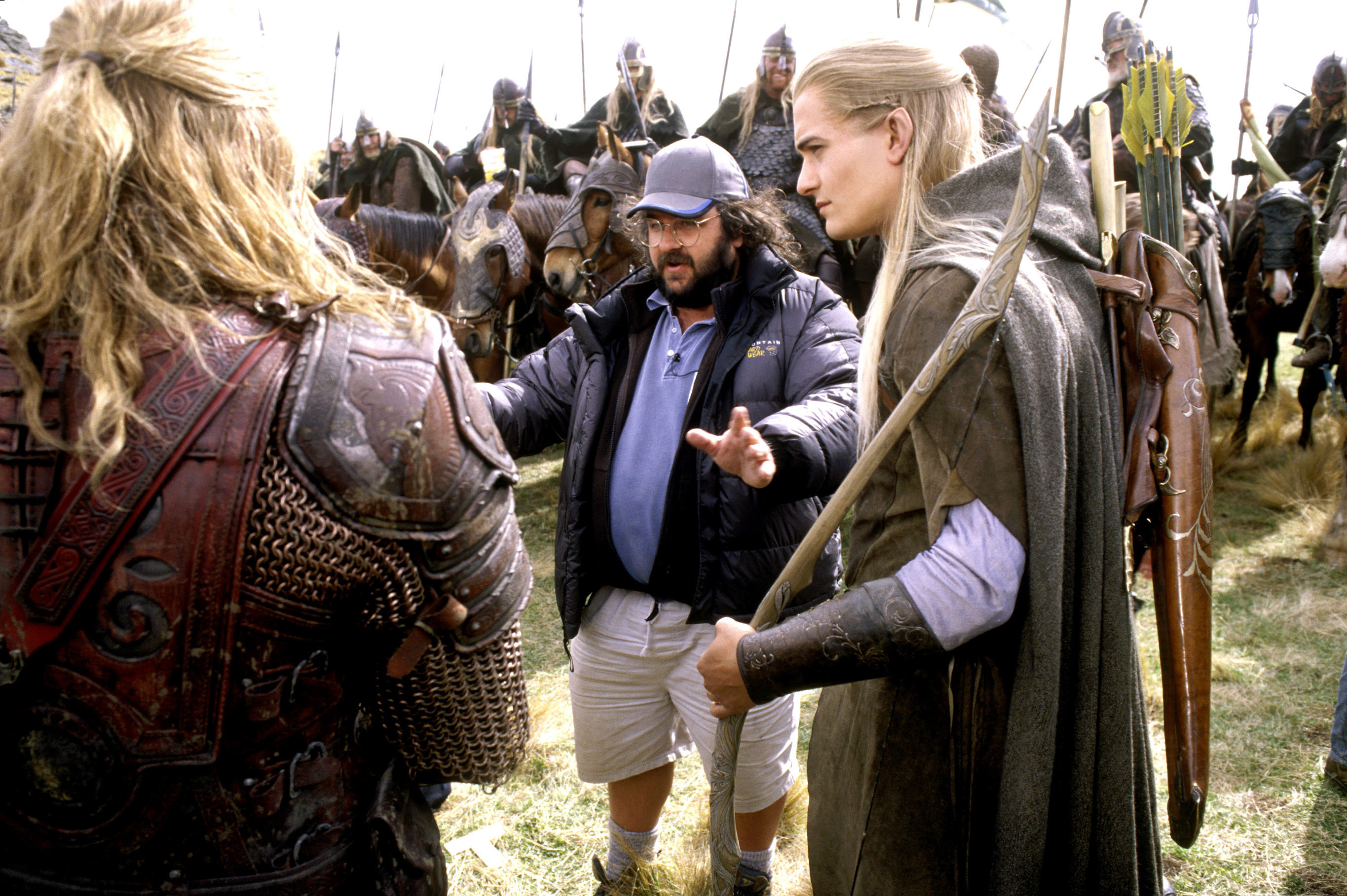 Orlando Bloom and Peter Jackson with others on set