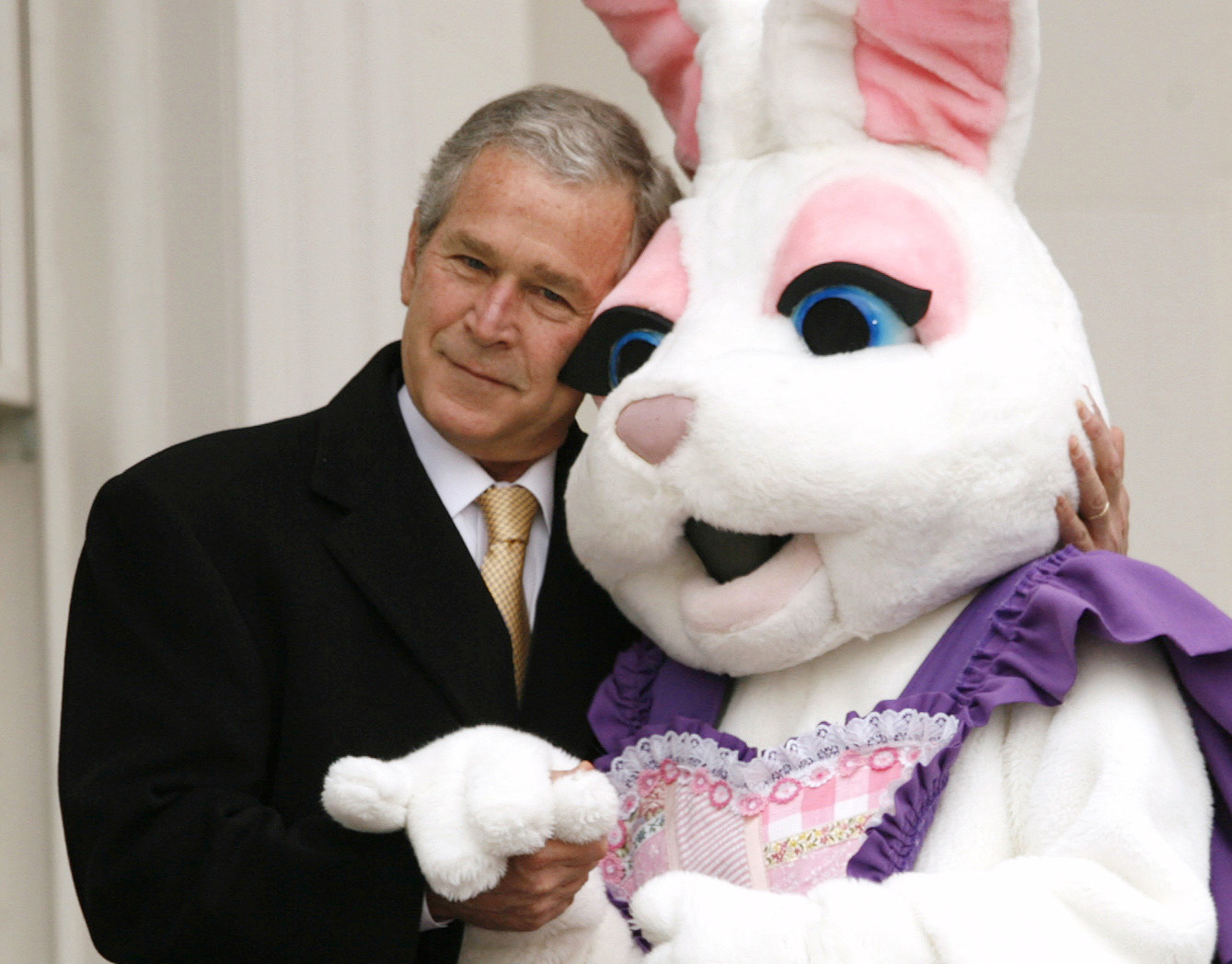 Bush hugs Pink Bunny&#x27;s head