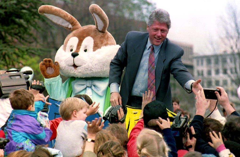 Clinton is seen next to a brown rabbit with a massive head