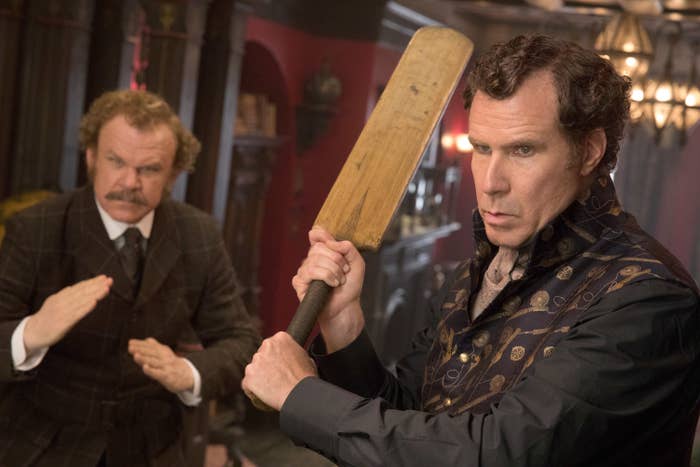 John C Reilly and Will Ferrell in character and pretending to fight