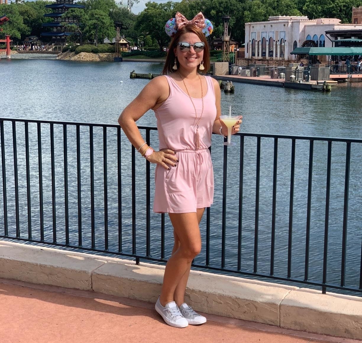 reviewer wearing the romper in pink