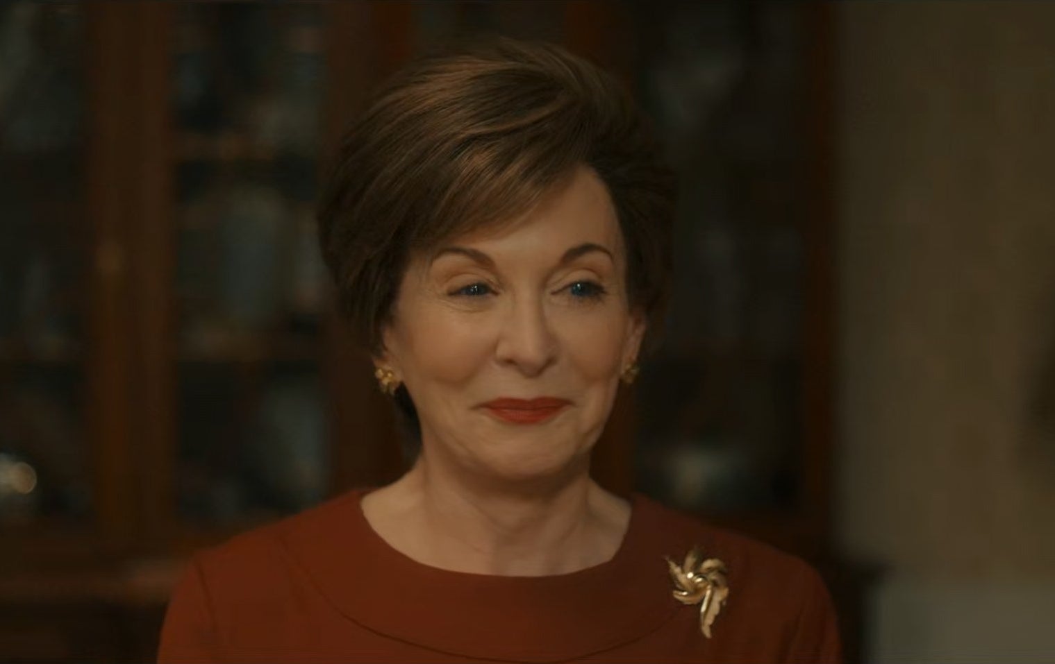 Kathleen Garrett as Laura Bush smiles