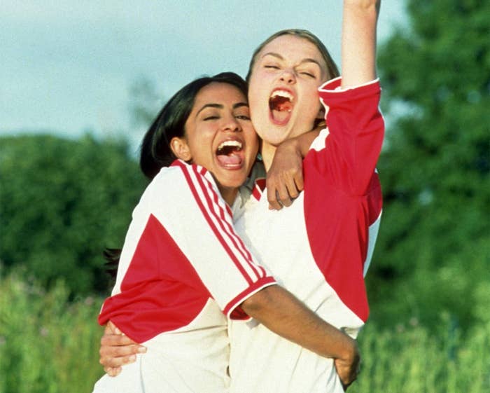 Parminder Nagra (Jess) and Keira Knightley (Jules) hugging each other and celebrating in Bend It Like Beckham
