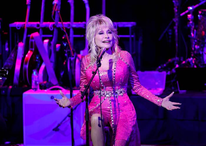Dolly Parton performing onstage.