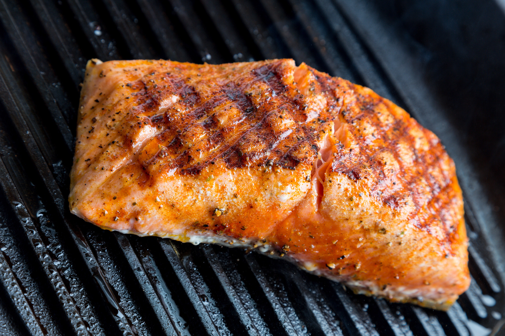 A salmon fillet on the grill.