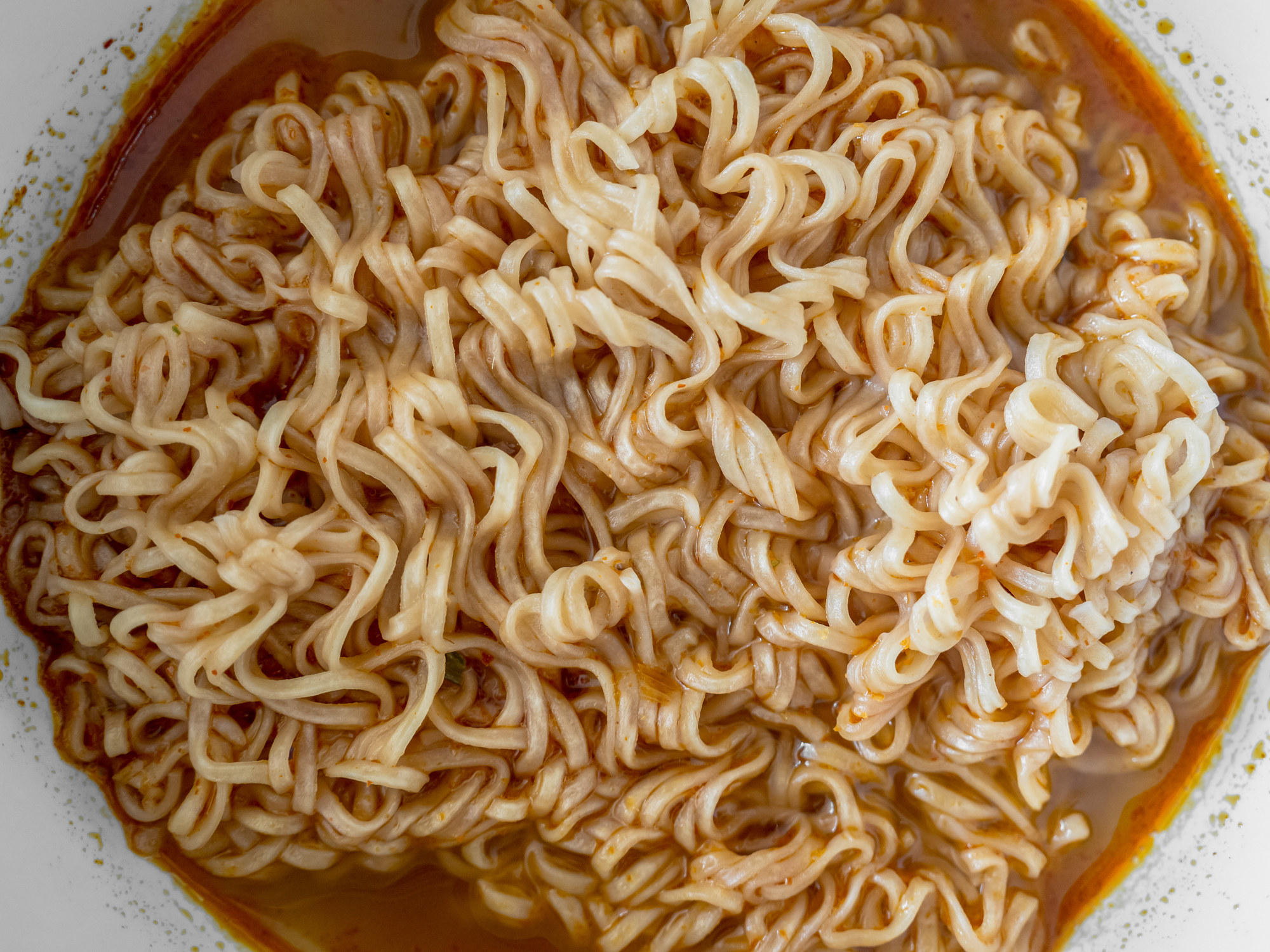 A bowl of spicy instant noodles.