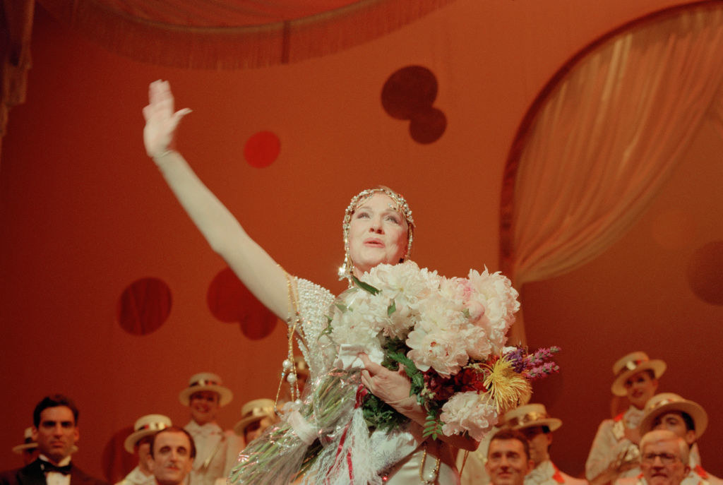 Julie Andrews performing onstage.