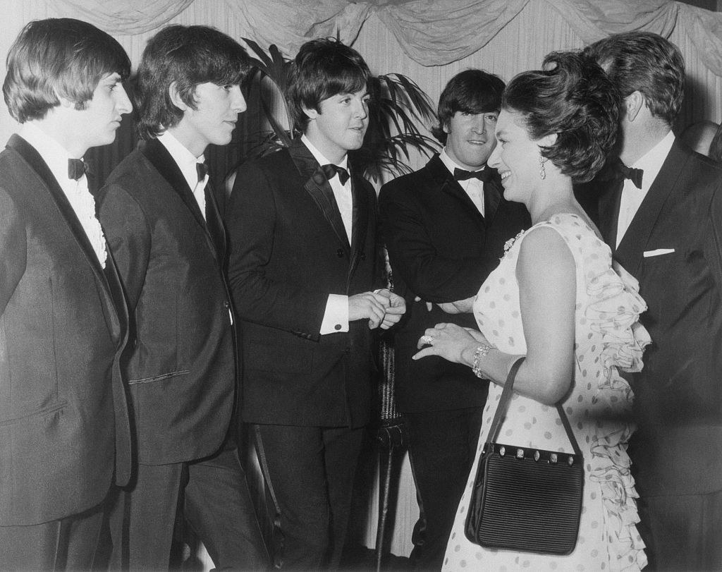 The Beatles at a meet-and-greet.
