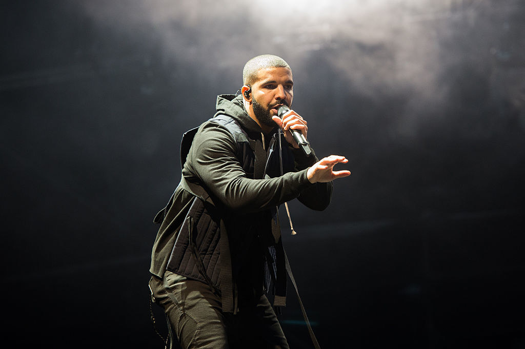 Drake performing onstage.
